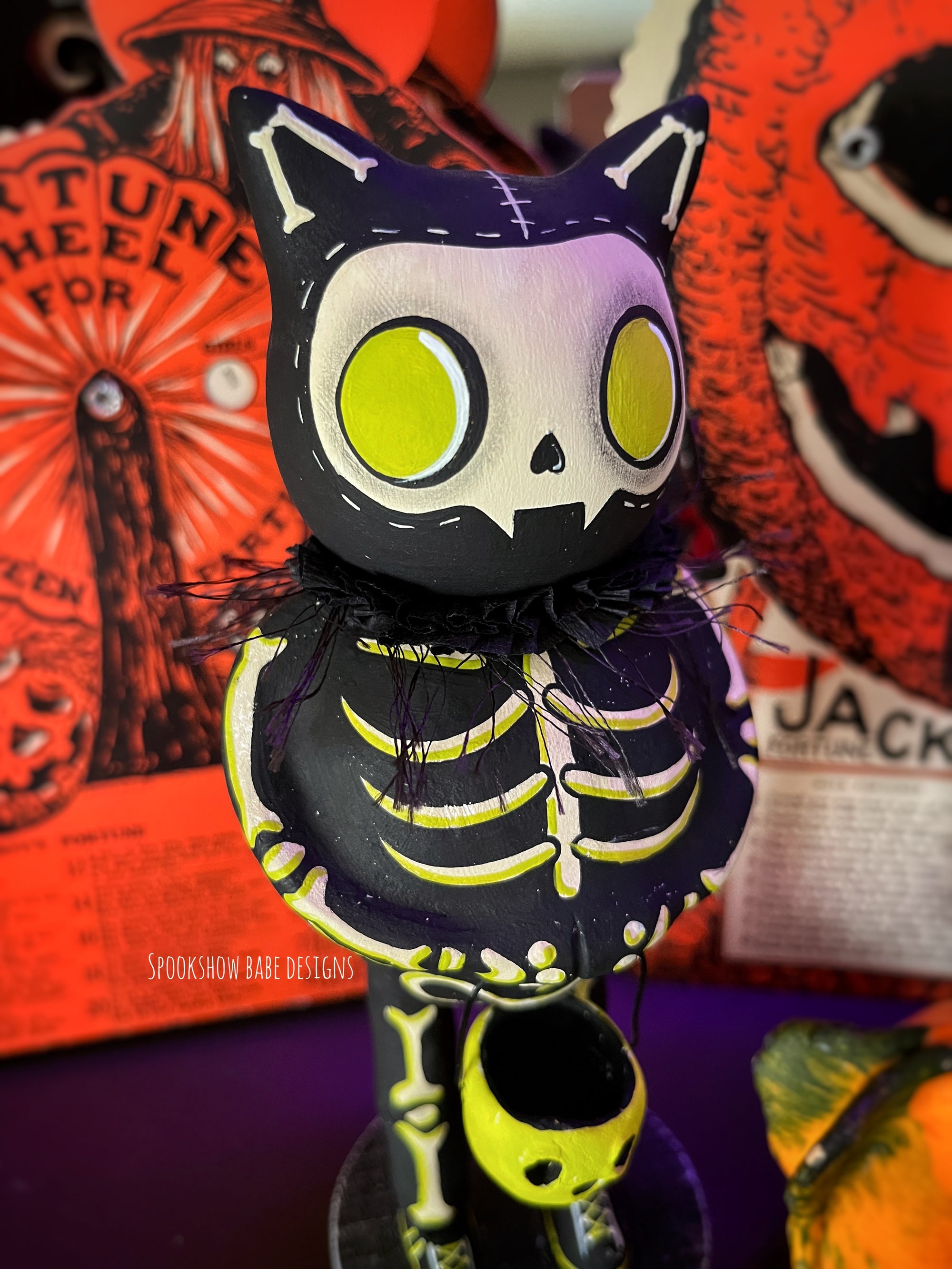 Trick or Treating Skeleton costume Cat with glowing lantern