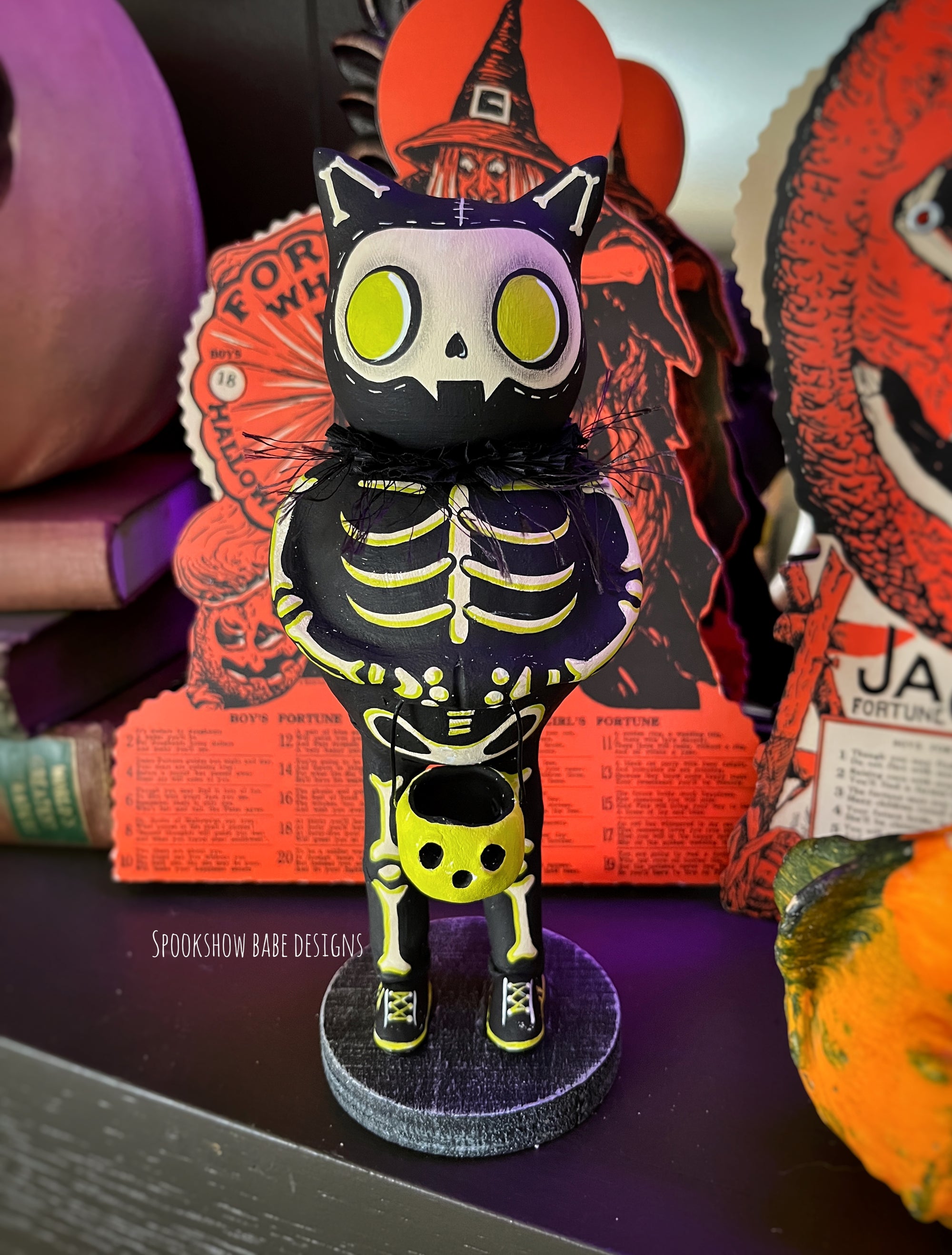 Trick or Treating Skeleton costume Cat with glowing lantern